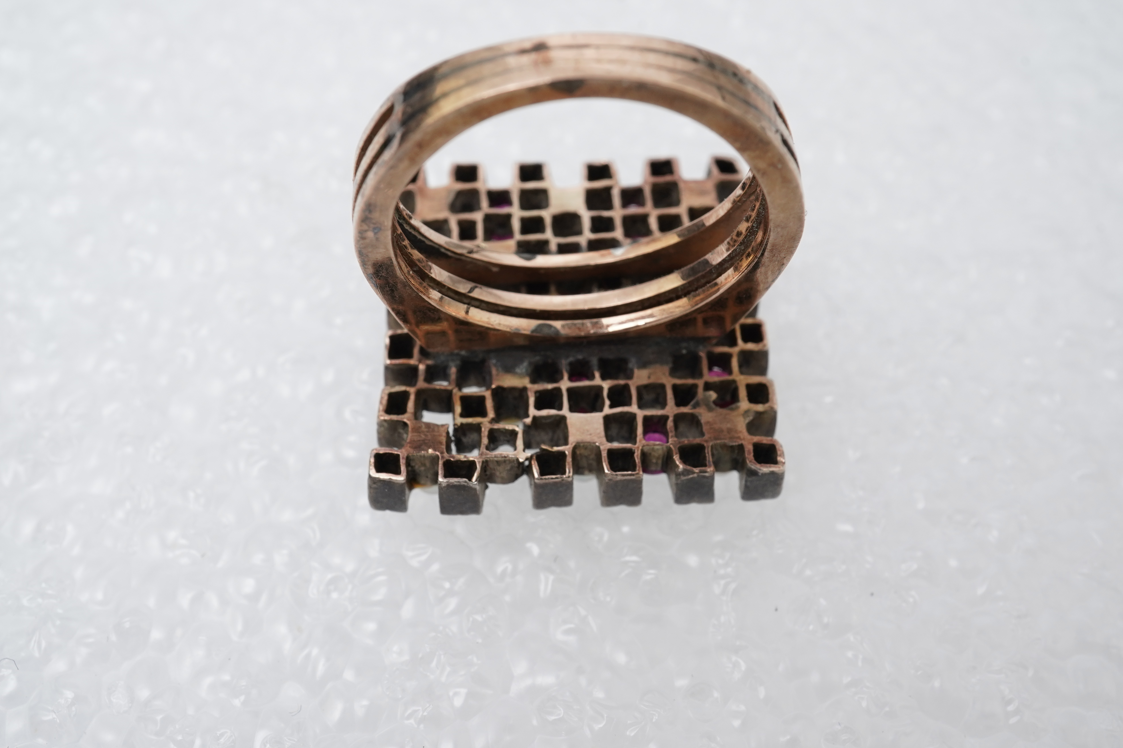 A synthetic ruby, seed pearl and diamond ring